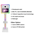 فوتوبوث TechnoWhale TW-156X بشاشة لمس LCD بحجم 15.6 بوصة مع شريط إضاءة RGB في الجهة الأمامية وعلى جانبي الجسم، بالإضافة إلى ضوء حلقي وكاميرا Canon 2000D يأتي مع حامل صغير للطابعة - Image 7